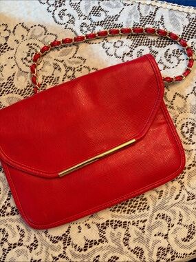 Red imitation leather bag.